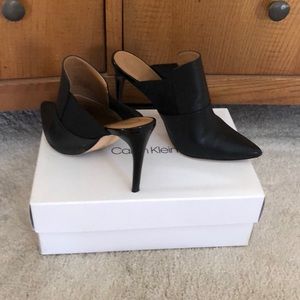 Black mule pumps